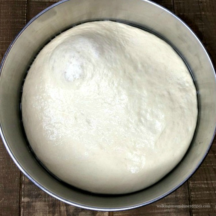 French Bread Baguettes dough risen in bowl ready to be formed. 