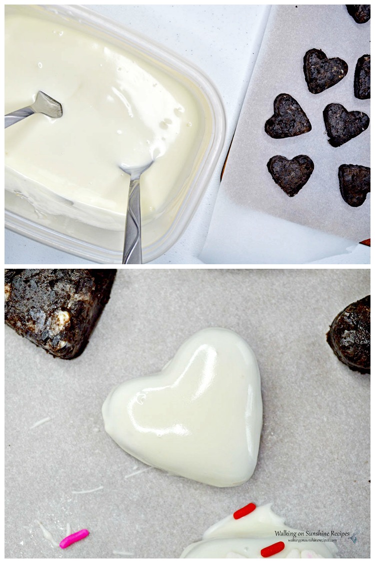 Dipping the Heart Shaped Oreo Truffles in Melted Chocolate 