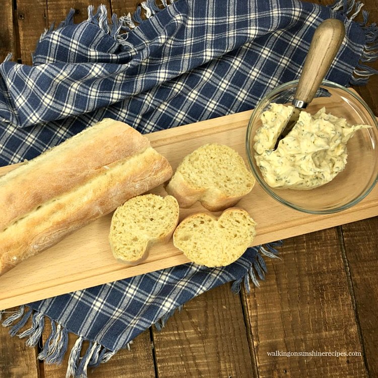 French Bread on board with homemade garlic butter
