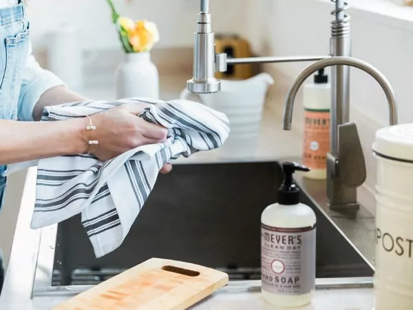 Mrs. Meyers cleaning products by sink featured on Walking on Sunshine Recipes