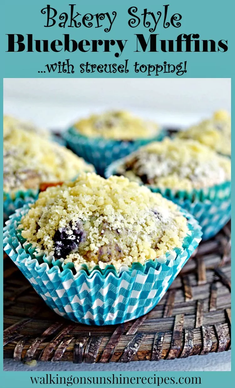 Bakery Style Blueberry Streusel Muffins cut open from Walking on Sunshine Recipes