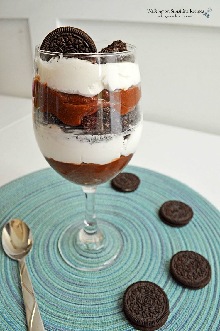 Chocolate Pudding Parfaits with whipped cream and Oreo Cookies. 