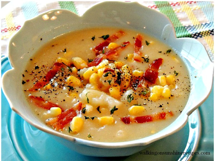 Potato and Corn Chowder with bacon in blue bowl.