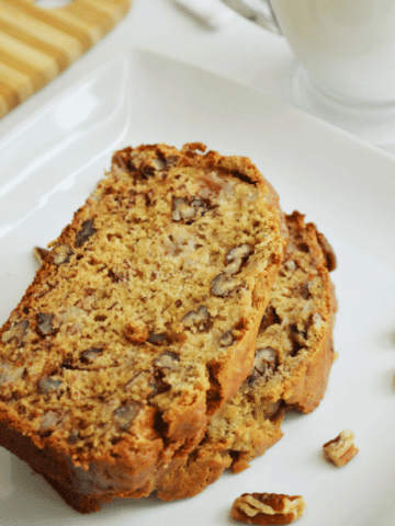 cropped-Banana-Nut-Bread-on-white-plate-from-Walking-on-Sunshine-Recipes.png