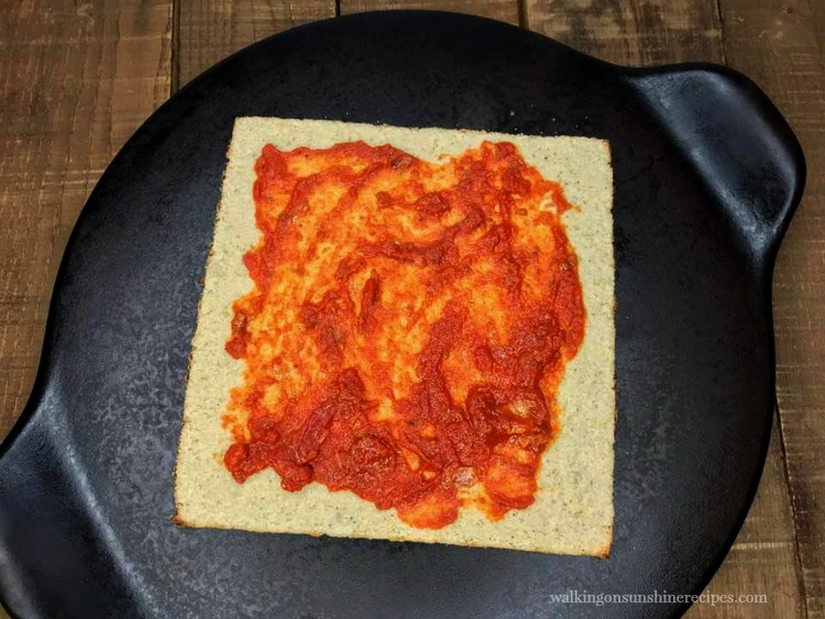 Marinara Sauce on cauliflower pizza crust. 