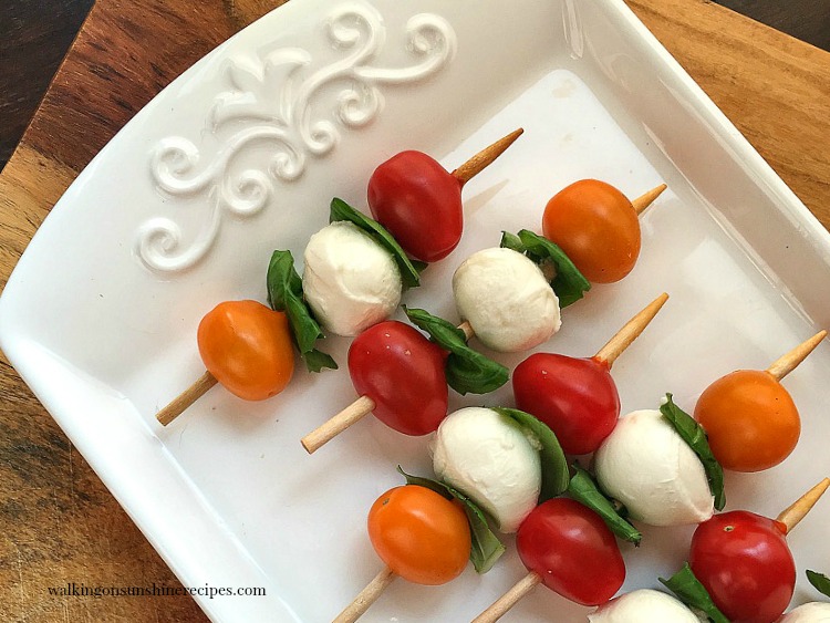 Caprese Antipasto Skewers are the perfect last minute appetizer for any holiday celebration!  Easy, delicious and they look beautiful on any buffet table.