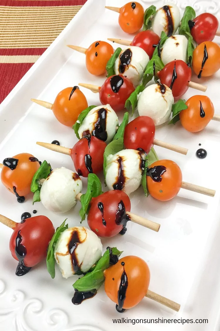 Drizzle the reduced balsamic vinegar glaze on top of the Caprese Antipasto Skewers just before serving. 