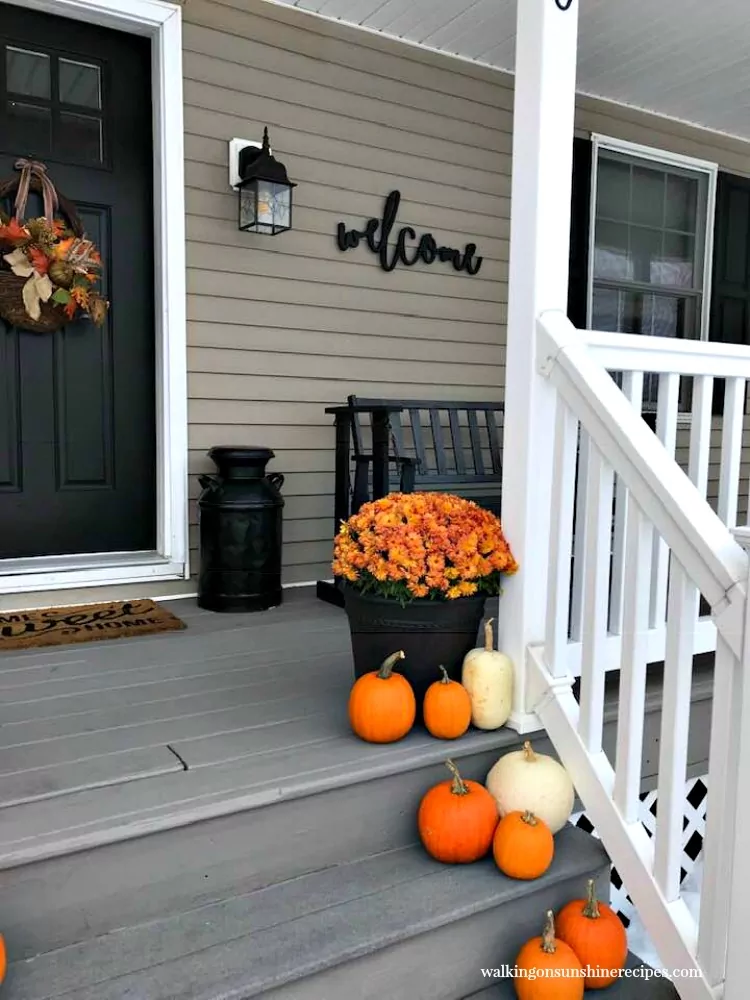 Front porch with mums and pumpkins from Walking on Sunshine Recipes