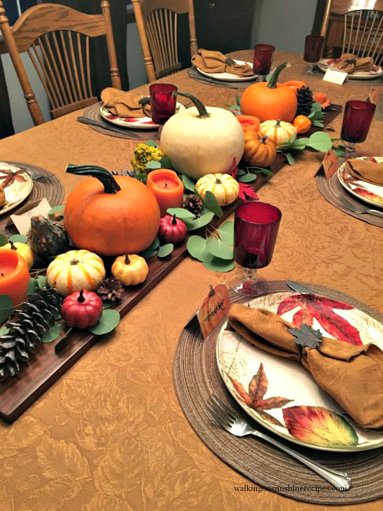 Easy last minute tips for decorating the Thanksgiving Table using pumpkins, gourds and fresh greenery.