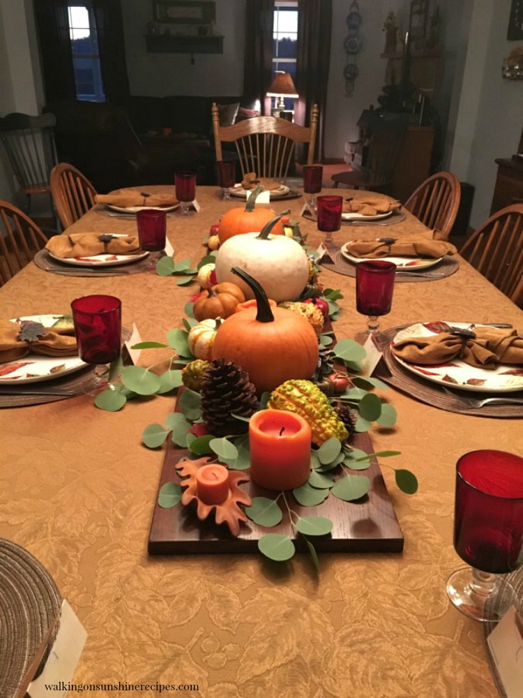 Easy last minute tips for decorating the Thanksgiving Table using pumpkins, gourds and fresh greenery.