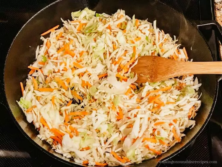 Add Cole Slaw Mixture to Cast Iron Pan for Air Fryer Wonton Appetizers
