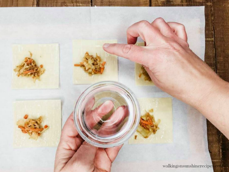 Add water to edges of wonton wrappers to seal for Air Fryer Wontons Wrappers. 