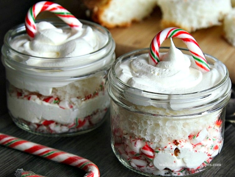 Angel food cake, candy cane pieces and whipped cream in mason jars. 