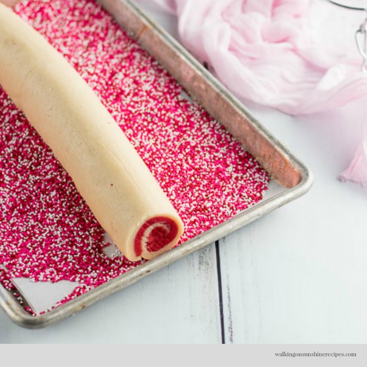 Roll cookie dough in sprinkles for Valentine's Day Swirl Cookies