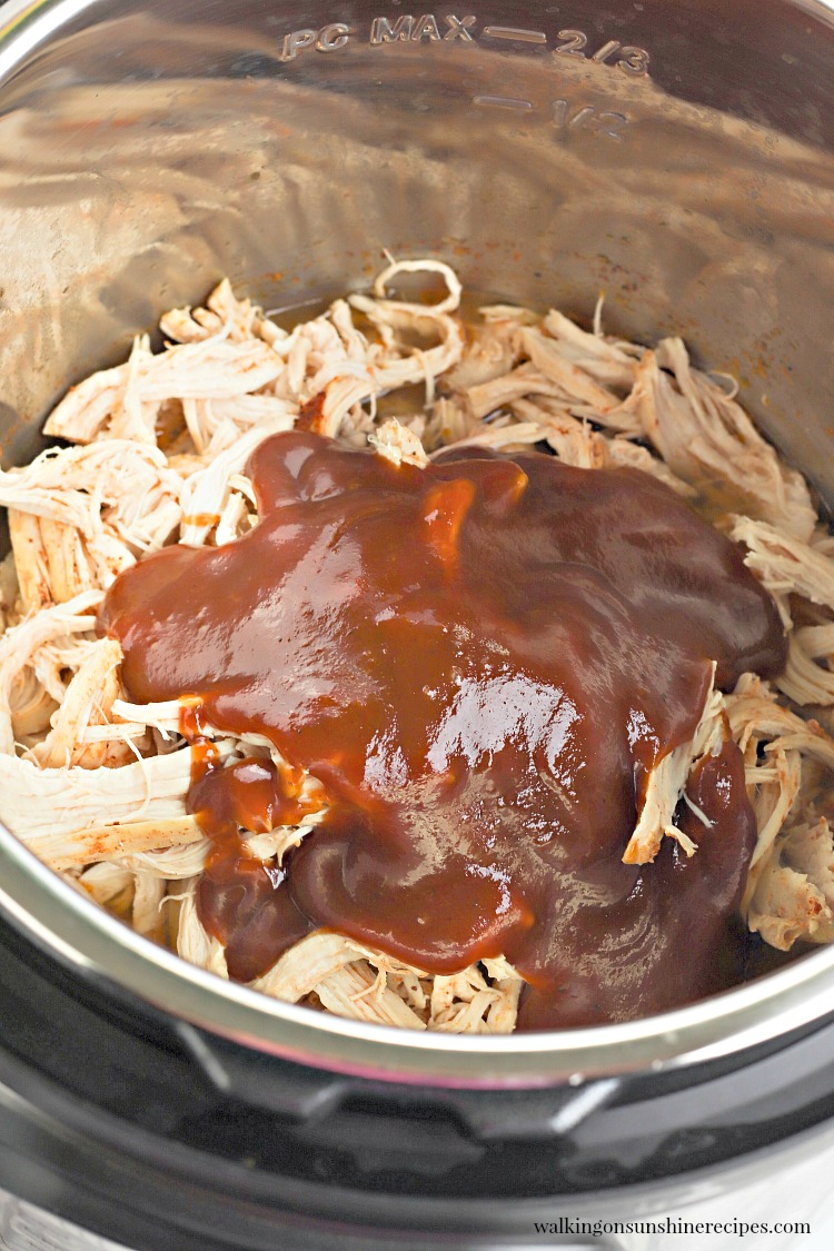 Add barbecue sauce to instant pot bbq chicken breast.