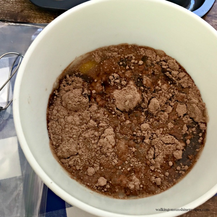 Chocolate Cake Mix in Bowl for donuts with eggs, oil and water. 