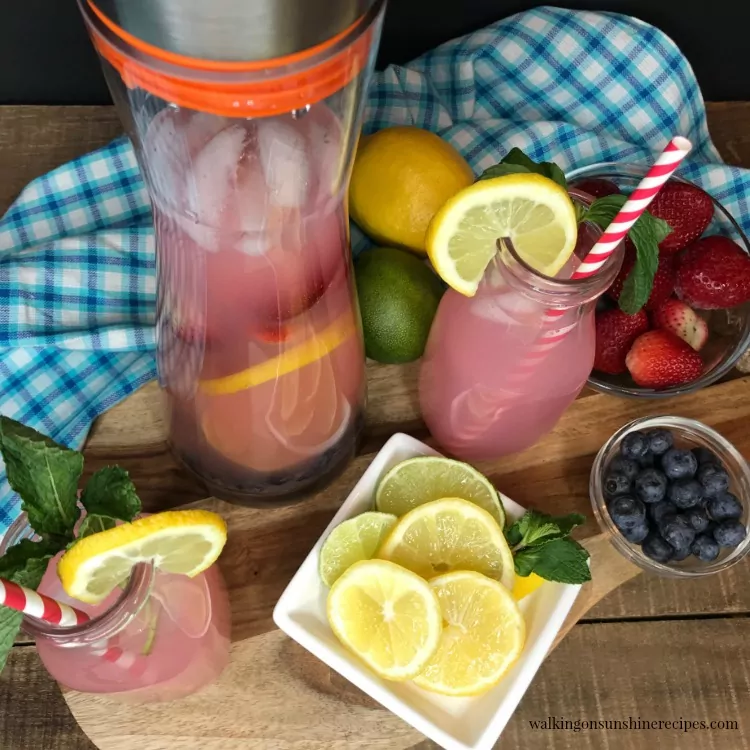 Overhead view of Strawberry Lemonade Punch Recipe with infused fruit from Walking on Sunshine Recipes