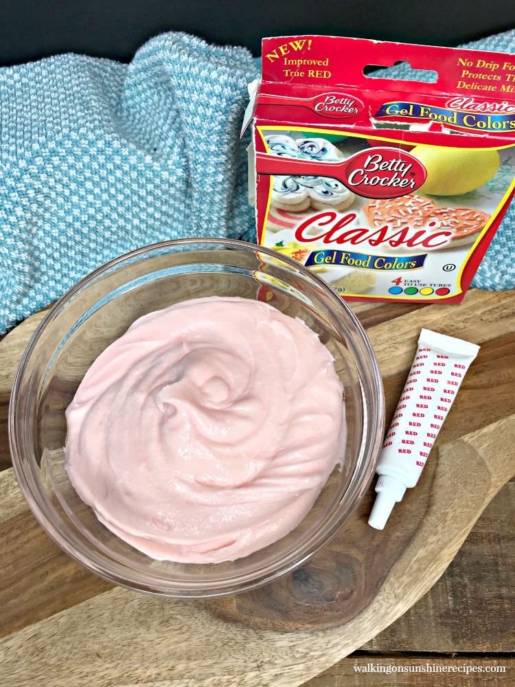 Use red food coloring to get the pink shade for the cream cheese mixture.