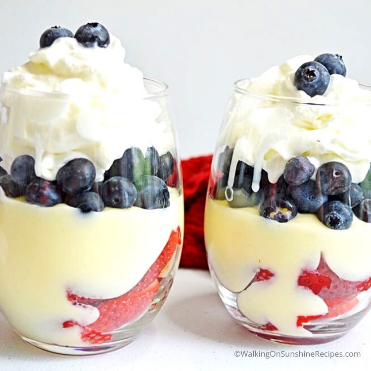Cheesecake pudding parfaits with strawberries and blueberries. 