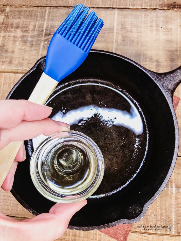 Brush oil in the bottom of the cast iron pan