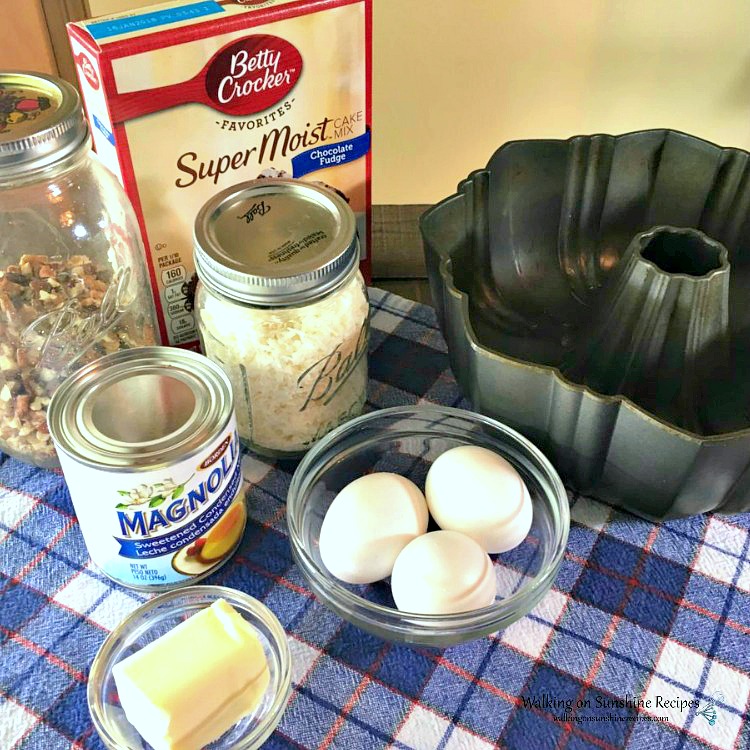 Cake Mix Recipe Hacks use a cake mix as ingredients to create delicious desserts, muffins, cookies and so much more. Here are a few of our favorites from Walking on Sunshine Recipes. Cake Mix with ingredients and bundt cake pan.