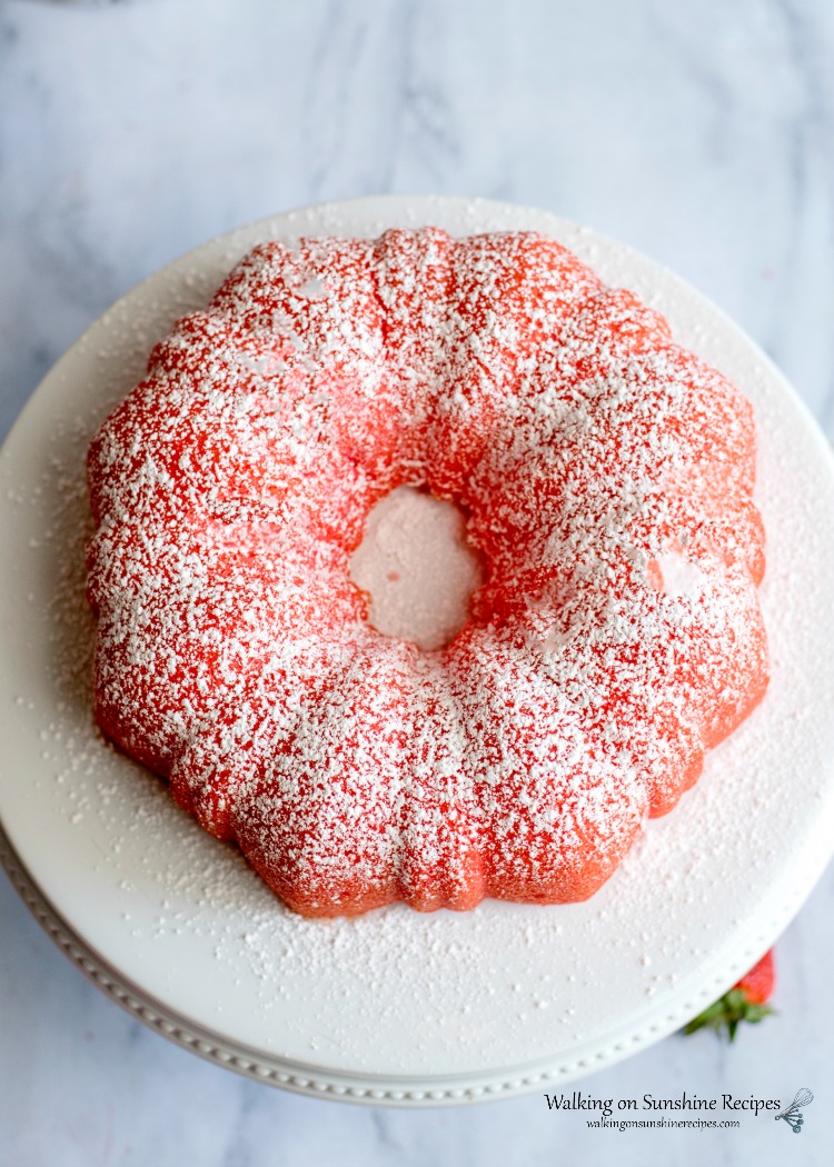 Strawberry Bundt Cake on white cake stand