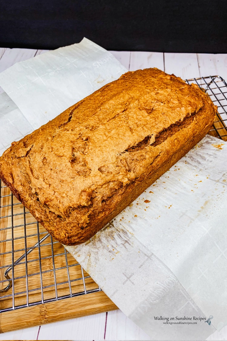 2 Ingredient Pumpkin Bread on parchment paper and wire rack