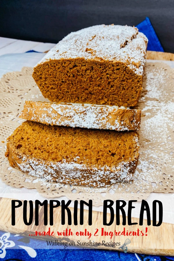 Pumpkin Bread with powdered sugar on cutting board
