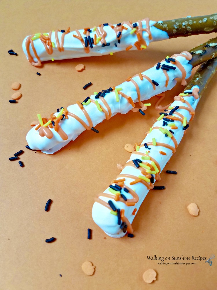 White Chocolate Covered Pretzel Rods decorated.