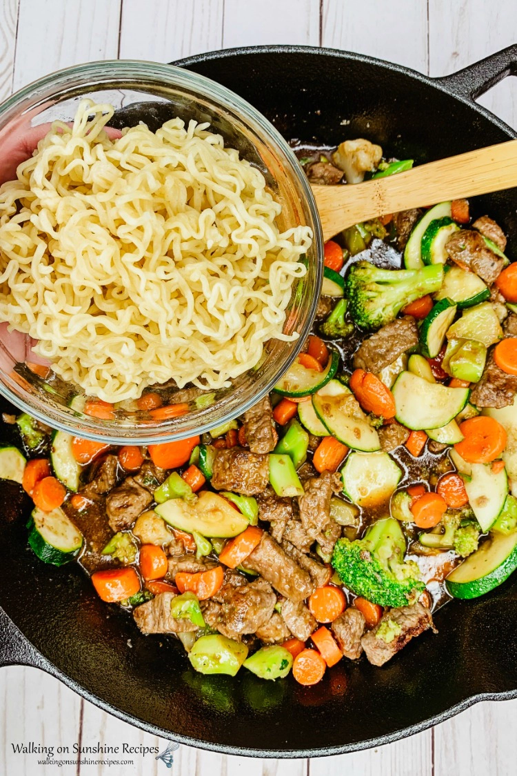 Add cooked Ramen Noodles to beef and veggies 