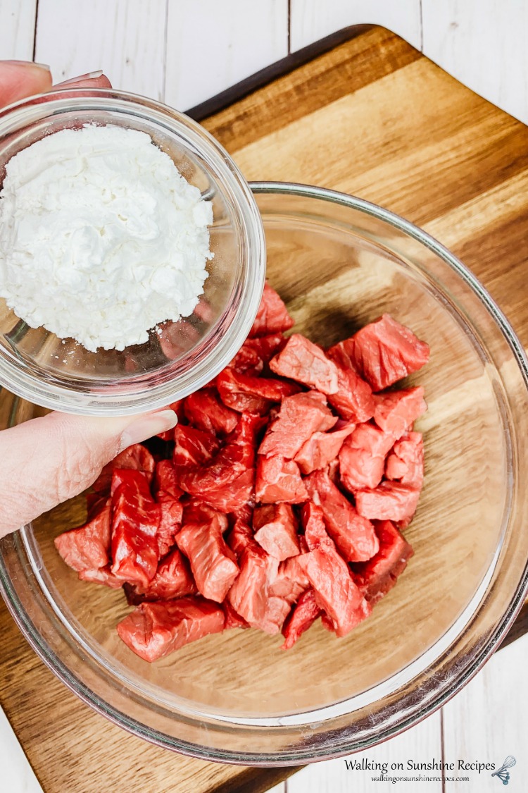Easy Beef Ramen Stir Fry is a quick budget-friendly meal your family is going to love made with a homemade sauce and ready in 20 minutes from Walking on Sunshine Recipes. Add cornstarch to beef for Beef Ramen Stir Fry