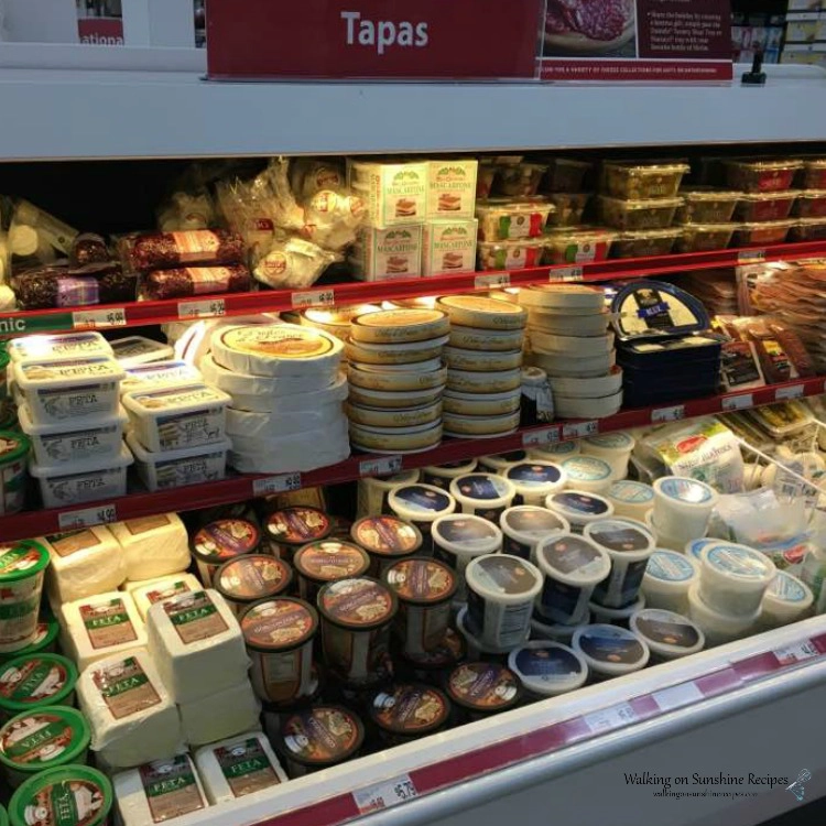Assortment of Cheeses in Grocery Store 