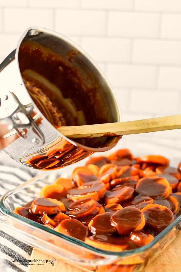 Candied Sweet Potatoes area a side dish staple for a successful holiday celebration. Step-by-step instructions with prep ahead tips included as well from Walking on Sunshine Recipes. Pour caramel sauce over cooked sweet potatoes in casserole dish