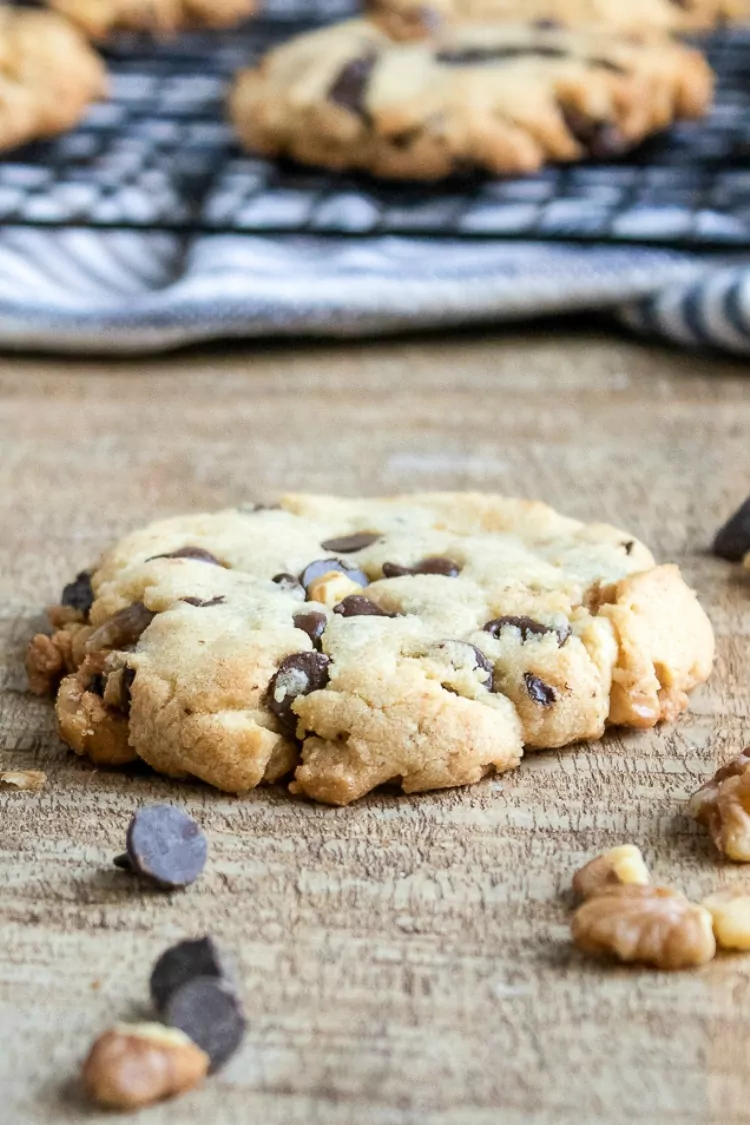Chocolate Chunk Cookies with Walnuts on wooden board. 