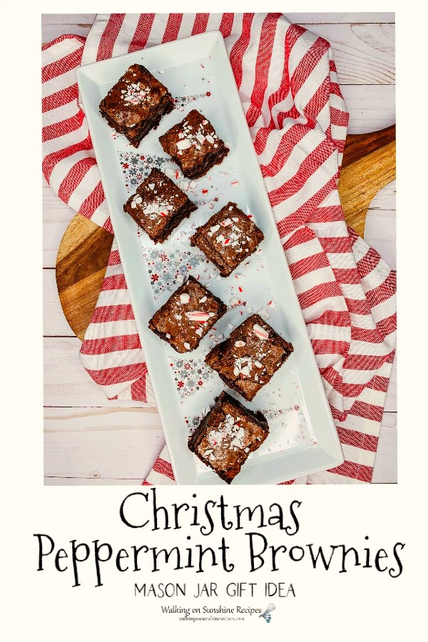 Homemade Peppermint Brownies on white tray and red striped towel. 