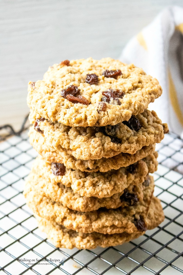 Classic Oatmeal Cookies - Soft and chewy yet crispy on the outside, these are going to become one of your favorite cookies to make all year long from Walking on Sunshine Recipes. Classic Oatmeal Cookies stacked on cooling rack from WOS