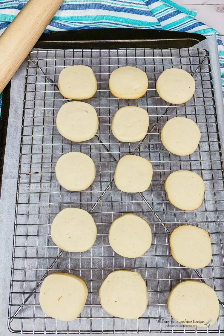 Cool baked shortbread cookies on baking rack.
