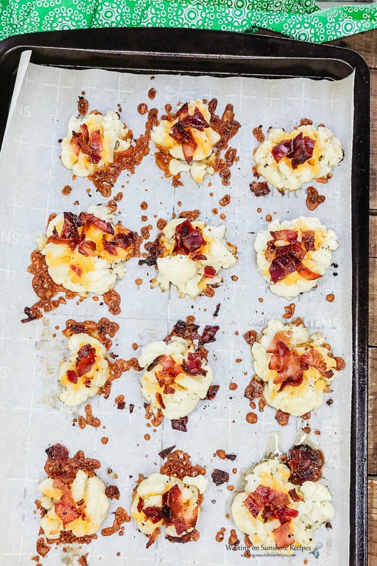 Loaded Smashed Cauliflower Bites baked on tray from WOS