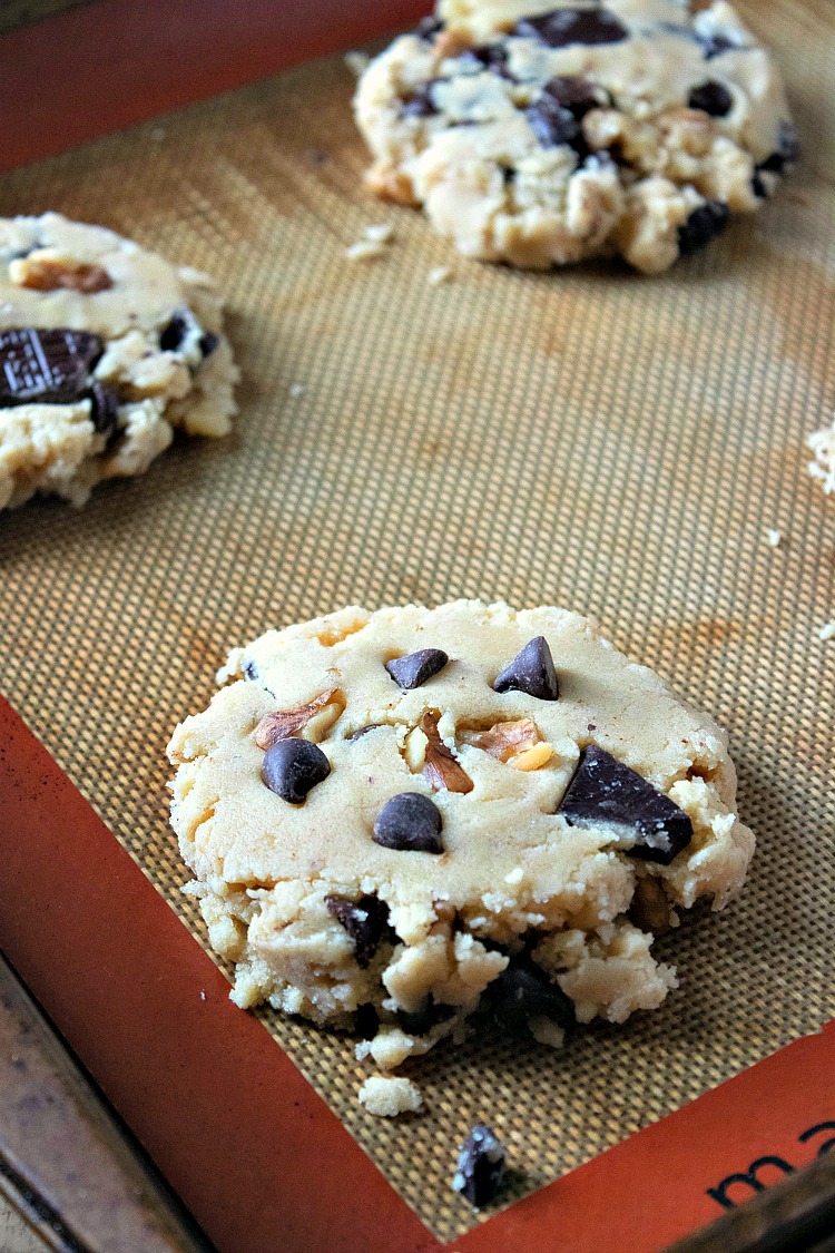 Walnut Chocolate Chunk Cookies on silpat baking sheet before baking