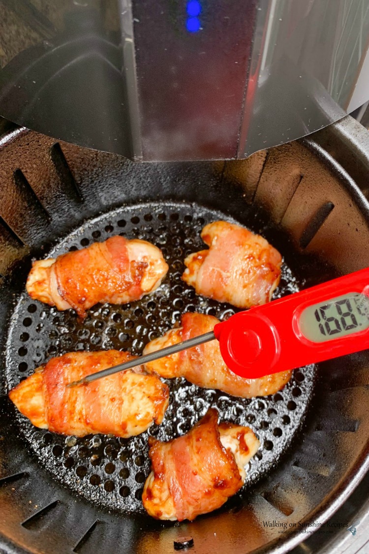 bacon wrapped chicken air fryer baked to 168 internal degrees with digital thermometer.