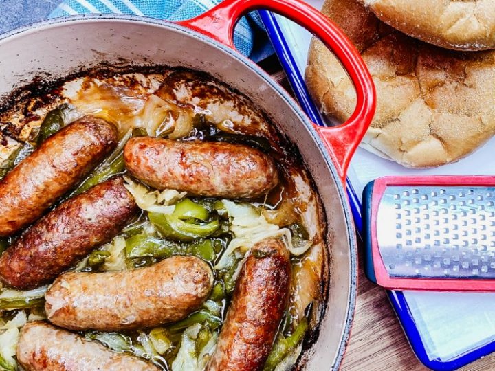 https://walkingonsunshinerecipes.com/wp-content/uploads/2020/02/Sausage-and-Peppers-in-Dutch-Oven-with-Hard-Rolls--720x540.jpg