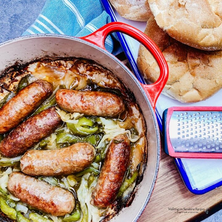 Sausage and Peppers served with sandwich rolls and freshly grated Parmesan Cheese.