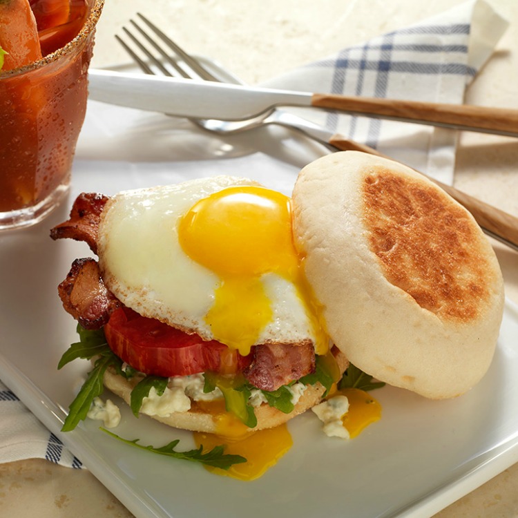 Sunny Side Egg in English Muffin with bacon. 