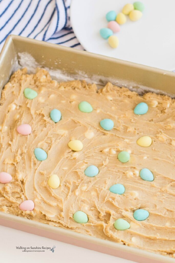 Add cookie bar batter to baking pan