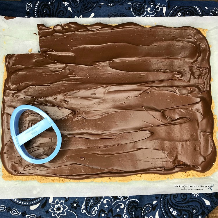 Cutting shapes out of the Chocolate Peanut Butter Layers