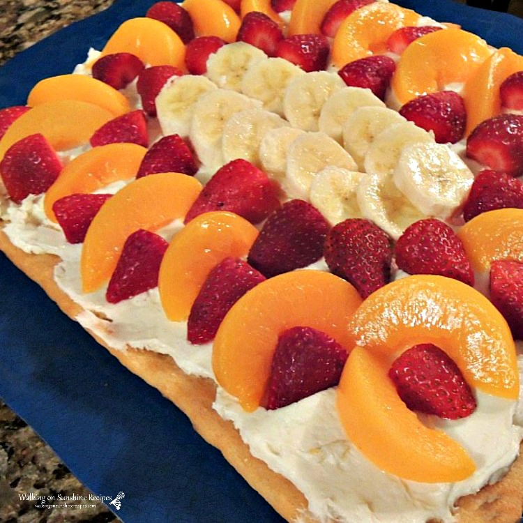 Fruit tart with peaches, bananas and strawberries