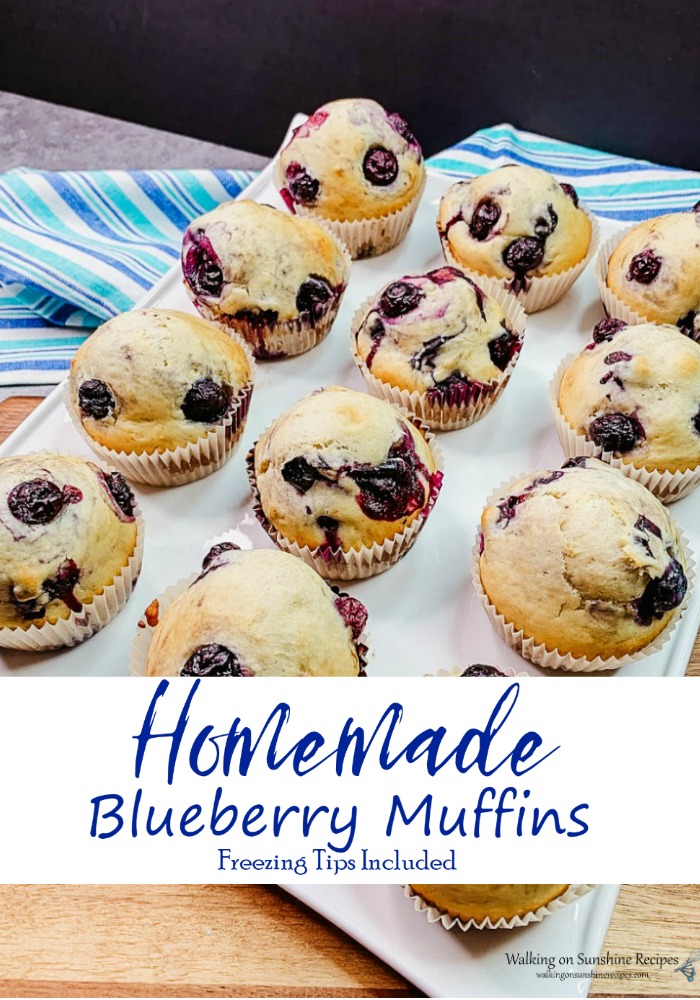 Homemade Blueberry Muffins on white tray.