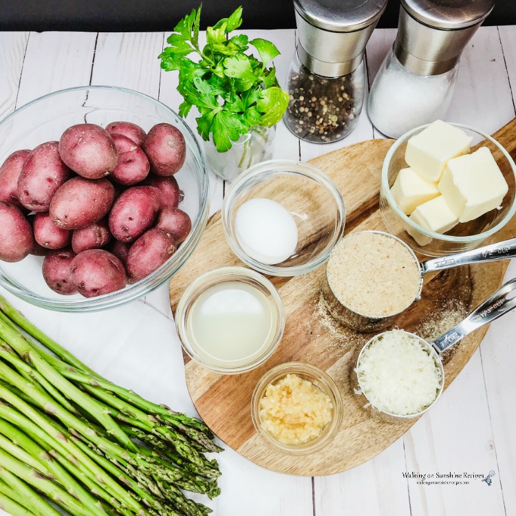 Ingredients for dinner laid out on cutting board.