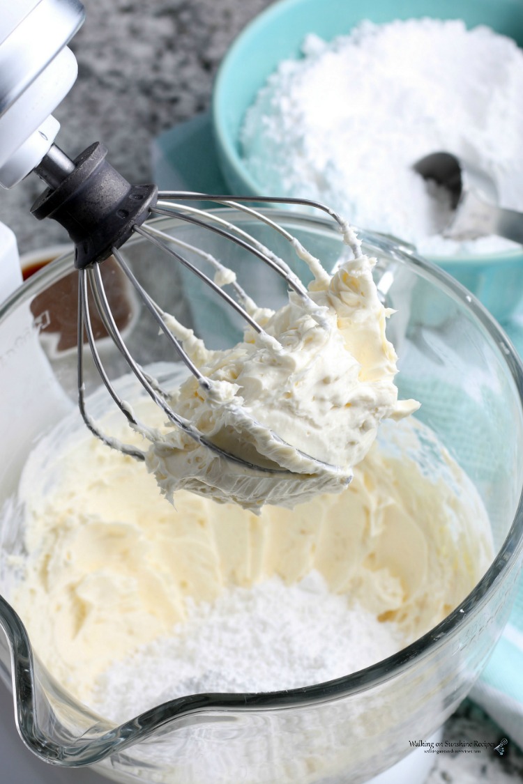 Add powdered sugar to Kitchen Aid Mixer with cream cheese and butter