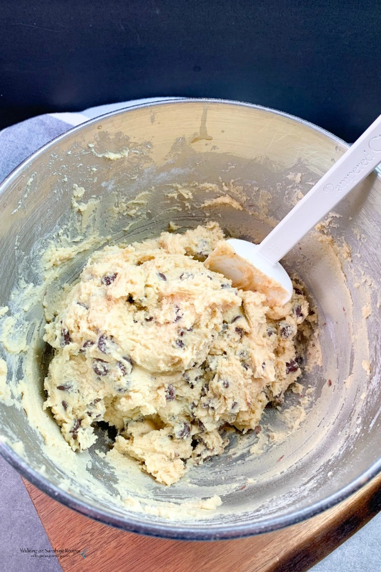 Chocolate chip cookie dough mixed in bowl